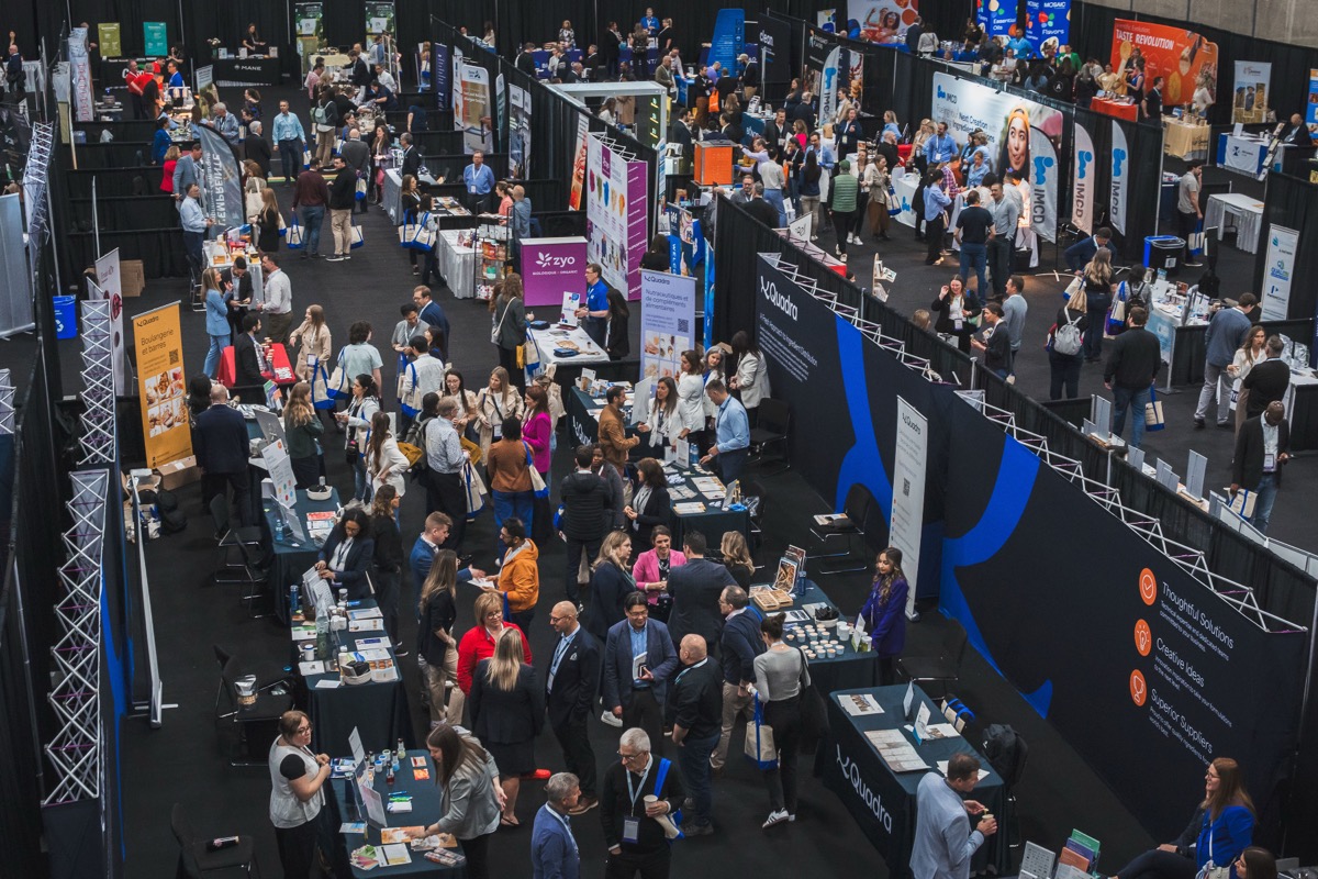 Wide view of the Supplier Show with exhibitors and visitors at Centre Expo Terrebonne